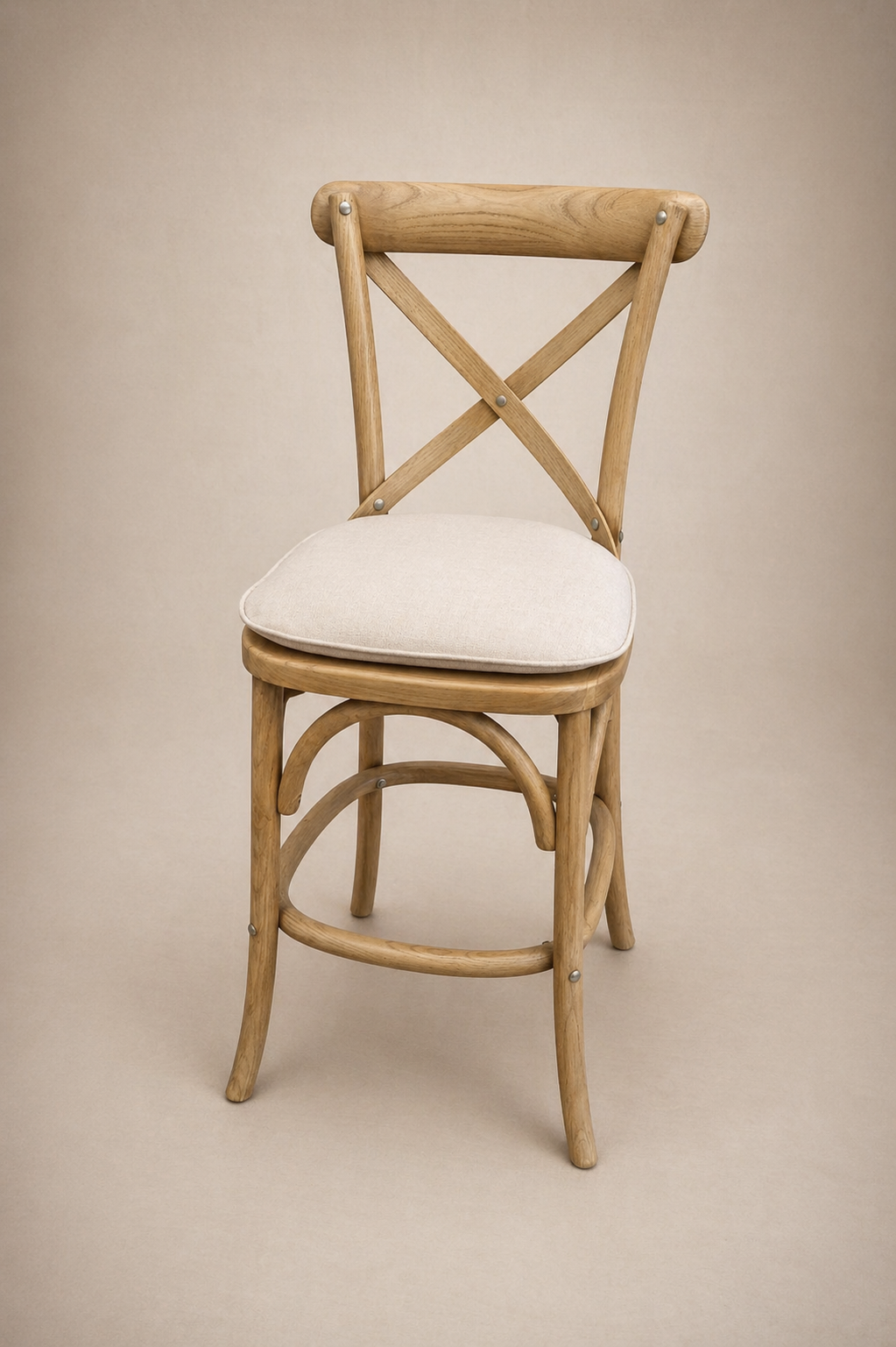 Bentwood cross-back dining chair in oak with cream linen seat pad
